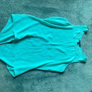 Open back teal tank